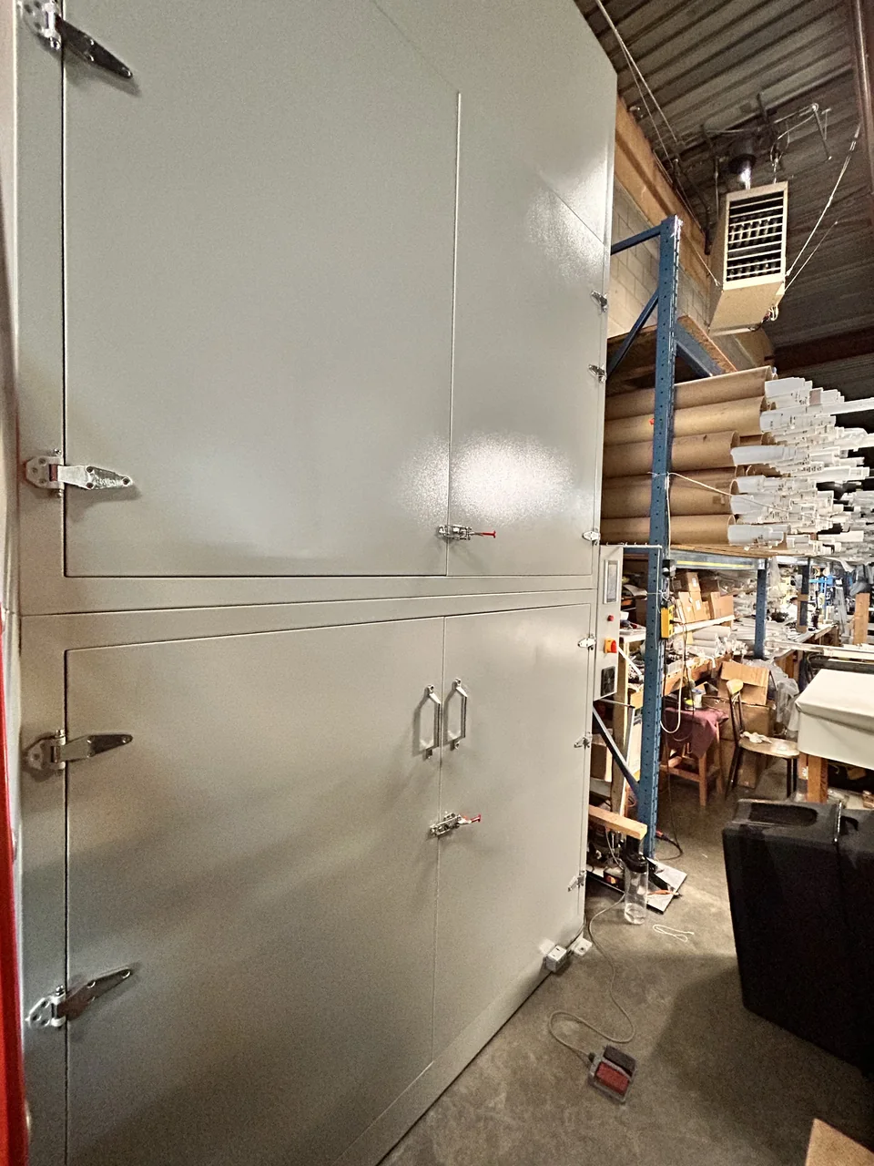 AAA Blinds' tall curtain heat-setting cabinet in the company workshop