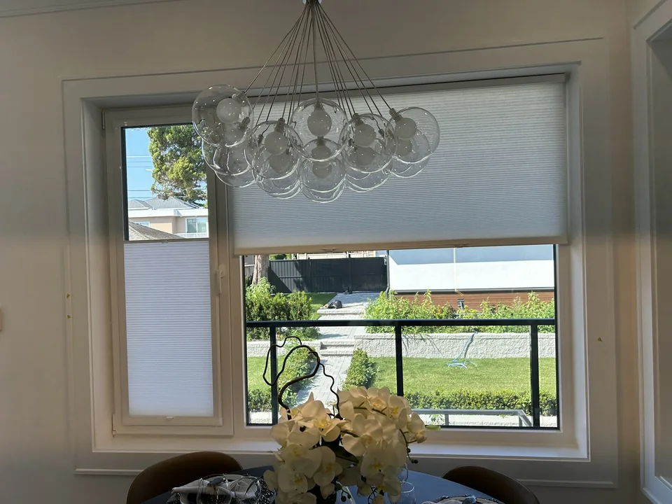 A cellular shade treatment demonstrates one approach to balancing the view and privacy